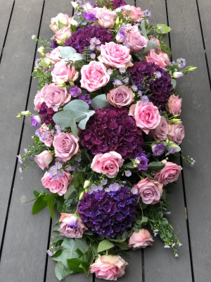 Lilac, purple and white coffin spray