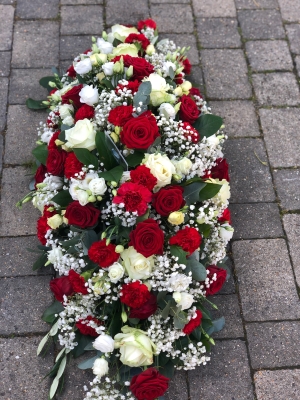 Red and white coffin spray with gyp
