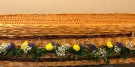 Coffin dressing roses, static and gypsophilia