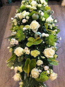 Green and white coffin spray