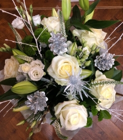 Silver and white Christmas hand tied