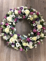 White wreath with a touch of Lilac